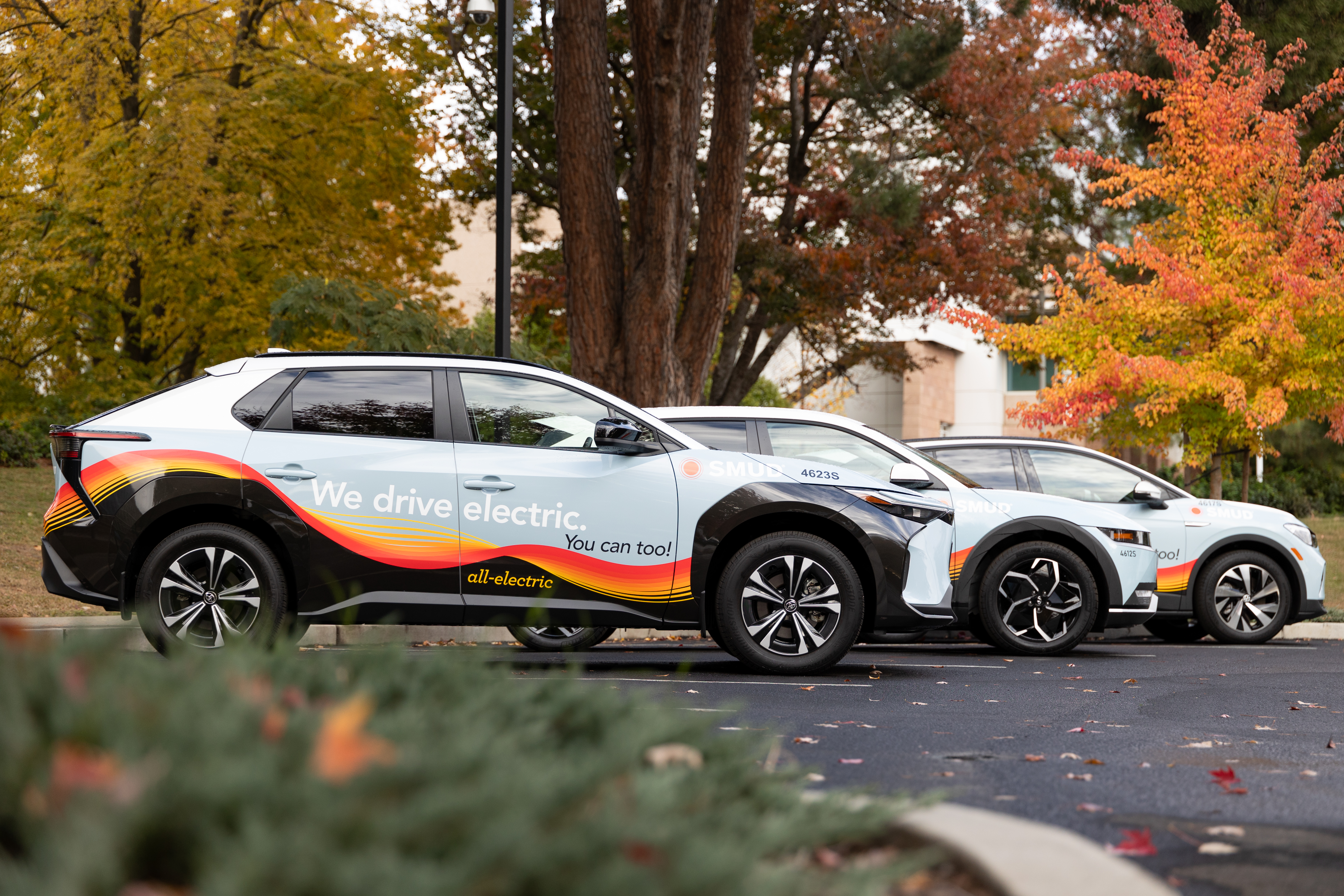 Electric vehicles branded with SMUD messages. Photo courtesy Sacramento Municipal Utility District.